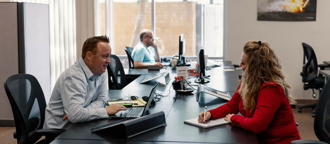 people working at coworking desk space